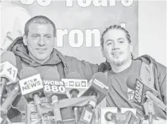  ?? — Reuters photo ?? Lopez and Lizama (left) take part in a news conference to recount their rescue from a malfunctio­ning scaffold on the side of One WorldTrade Center a day before in New York.