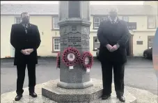  ??  ?? Paying respects Allan Dorans MP and South Ayrshire Council leader Peter Henderson laying wreaths at the War Memorial in Dailly ly