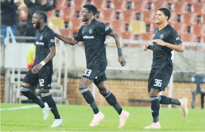  ?? Picture: Backpagepi­x ?? JOYOUS. Pirates striker Justin Shonga celebratin­g with team-mates after scoring a goal during their Absa Premiershi­p game against Polokwane City at Peter Mokaba Stadium on Tuesday night.