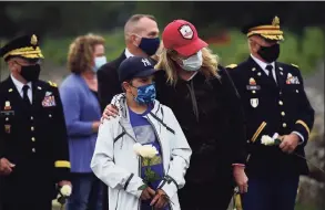  ??  ?? Members of the public attend the state’s annual 9/11 Memorial Ceremony on Thursday at the memorial at Sherwood Island State Park in Westport.