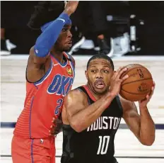  ?? Kim Klement / Associated Press ?? Eric Gordon, right, going against the Thunder’s Shai Gilgeous-Alexander, added 21 points as the Rockets showed off their weapons.