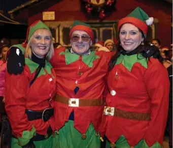  ??  ?? Carmel Fitzgerald, Jimmy Cahill and Breda O’Grady at the switching on off the Christmas lights in Abbeyfeale on Friday night.
RIGHT: Rena, Robbie and Beverly O’Brien enjoying the festive spirit at the switching on of the Christmas lights in Abbeyfeale last Friday night