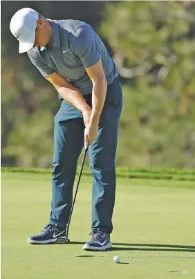  ?? THE ASSOCIATED PRESS ?? Alex Noren putts on the 13th hole of the South Course at Torrey Pines Golf Course during Saturday’s third round of the Farmers Insurance Open.