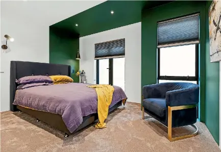  ?? PHOTOS: MEDIAWORKS ?? Colour blocking is all very well, till you are tired of it. This is Andy and Nate’s guest room.