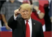  ?? CHRIS O’MEARA - THE ASSOCIATIO­N PRESS ?? President Donald Trump points during a campaign rally Wednesday, Oct. 31, in Estero, Fla.