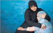  ?? BURHAAN KINU/HT PHOTO ?? Asgari Begum (In blue), mother of Mohammad Ikhlaq after he was lynched over beef rumours.