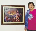  ??  ?? Jane Ramos with her painting “Sinaing ng Ina.” Jane develops her craft through learning and teaching art at the Ford Academy. She also believes that art is healing and she worked with kids using art for therapy.