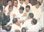  ?? REUTERS ?? ■ Sri Lankan MPs scuffle during a heated Parliament session in Colombo on Thursday.