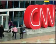  ?? (AP) ?? People enter CNN Center, the headquarte­rs for the cable news channel, in downtown Atlanta in this file photo. CNN’s website was among those affected by Tuesday’s blackout involving the cloud computing service Fastly.