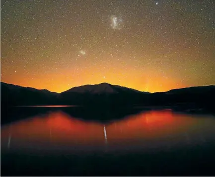  ?? PHOTO: TERRY URBAN ?? The aurora at Lake Rotoiti on April 23, captured by Nelson photograph­er Terry Urban.