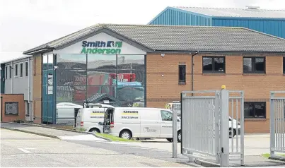  ?? Main picture: George McLuskie. ?? Above: Smith Anderson’s premises at Mitchelsto­n Industrial Estate in Kirkcaldy. Below: group chief executive Michael Longstaffe and, right, some of the paper bag range made in Fife for McDonald’s.