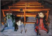  ?? ?? Pilgrims’ backpacks are seen June 1 inside of a small church along the Camino de Santiago in Rabe de las Calzadas.