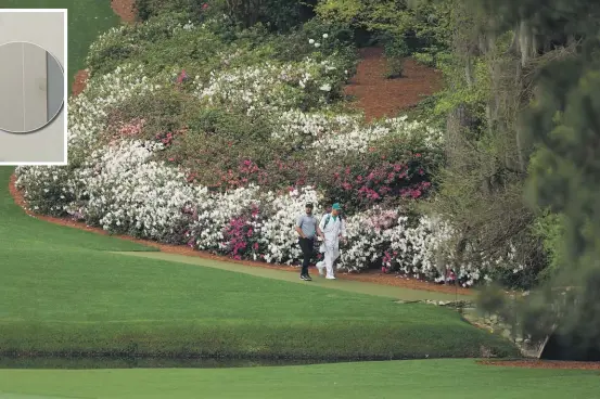  ?? GETTY IMAGES ?? Nothing says Augusta and The Masters like azaleas. Here Ryan Fox walks to the 13th fairway during a practice round last year.