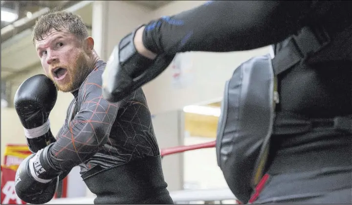  ??  ?? Erik Verduzco Las Vegas Review-Journal @Erik_Verduzco Saul “Canelo” Alvarez, training at his San Diego gym, faces Julio Cesar Chavez Jr. on May 6. “Boxing needed this fight. What a great fight for the Mexican people,” Alvarez says.