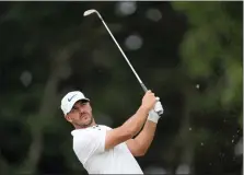  ?? ROBERT F. BUKATY — THE ASSOCIATED PRESS ?? Brooks Koepka watches his shot on the 11th hole during the second round of the U.S. Open golf tournament at The Country Club, Friday, June 17, 2022, in Brookline, Mass.