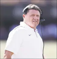  ?? Mark Humphrey / Associated Press ?? Coach Ed Orgeron and No. 5 LSU still have three opponents remaining currently ranked in the top 10.