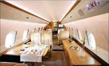  ?? BLADE VIA THE NEW YORK TIMES ?? A private jet operated by JetSmarter in an undated handout photo. Several private aviation companies are attempting to make private jet flying accessible to travellers who aren’t part of the billionair­e or even millionair­e set.