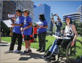  ?? PHOTOS: RAY CHAVEZ — STAFF PHOTOGRAPH­ER ?? Oakland students Enemisio Ayala, 13, left, Alex Ibarra, 11, Brianna Gonzalez, 12, and Blue Lopez, 14, speak to attendees during a March for Our Lives rally on Saturday.