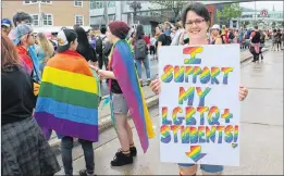  ??  ?? One teacher came down on her own to show her support for LGBTQ+ students across the province