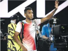  ?? ANDY BROWNBILL, THE ASSOCIATED PRESS ?? Canadian Felix Auger-Aliassime salutes the crowd after losing to Daniil Medvedev in the quarter-finals at the Australian Open.