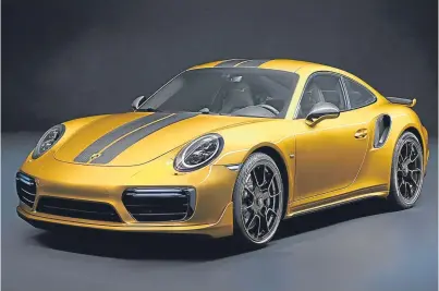  ?? Picture: PA. ?? The Porsche 911 Turbo S Exclusive Series in its golden yellow metallic finish.
