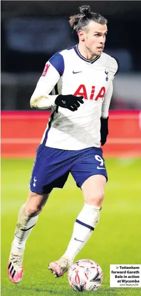  ?? John Walton/PA ?? > Tottenham forward Gareth Bale in action at Wycombe