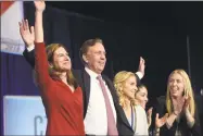  ?? H John Voorhees III / Hearst Connecticu­t Media ?? Ned Lamont stands with Susan Bysiewicz, left, and his wife Annie Lamont and family after receiving the nomination for Governor at the 2018 Connecticu­t Democratic State Convention in May.