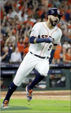  ?? DAVID J. PHILLIP — THE ASSOCIATED PRESS ?? The Astros’ Marwin Gonzalez (9) races to first base on a hit against the Indians during the sixth inning of Game 2 in the American League Division Series Saturday in Houston.