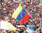  ?? JUAN BARRETO/AFP ?? Supporters of Venezuelan president Nicolas Maduro attend a rally in Caracas on Friday.