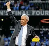  ?? PAUL SANCYA/AP 2009 ?? Roy Williams celebrates after North Carolina’s victory over Michigan State in the Final Four championsh­ip game, one of three national championsh­ips his teams won.