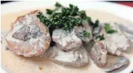  ?? LAURIE SKRIVAN/ST. LOUIS POST-DISPATCH ?? Medallions of Pork with Mushrooms in Cognac-Cream Sauce are made with pork tenderloin.