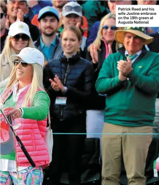  ??  ?? Patrick Reed and his wife Justine embrace on the 18th green at Augusta National