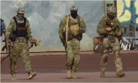  ?? Photograph: AP ?? Russian mercenarie­s in northern Mali. Analysts say the Wagner group is key to Putin’s ambitions to re-impose Russian influence on a global scale.