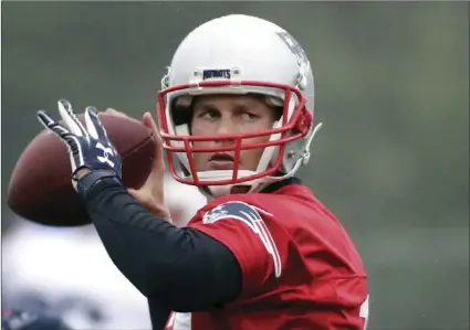  ??  ?? In this June 6 file photo, New England Patriots quarterbac­k Tom Brady throws a pass during NFL football team practice in Foxborough, Mass. AP PHOTO