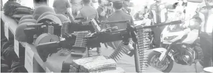  ??  ?? The Police Regional Office-7 assures the public that these sub-machine guns would not be used in the anti-illegal drug operations. Aside from the guns, they also got new vehicles, motorcycle­s, bullet-proof vests and helmets.