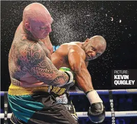  ?? ?? Punch bag: Dillian Whyte lands a fierce blow on Lucas Browne during a win that enhances his claims for a world-title fight