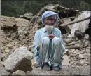  ?? THE ASSOCIATED PRESS ?? An Afghan man sits near his house that was destroyed in an earthquake in the Spera district in the southweste­rn part of Khost province, Afghanista­n, on Wednesday.