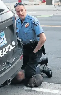  ?? Picture: Darnella Frazier/Facebook/Darnella Frazier/AFP ?? This still image taken from a May 25 video, courtesy of Darnella Frazier via Facebook, shows Minneapoli­s police officer Derek Chauvin arresting George Floyd. Witnesses say that Floyd repeatedly told police, ‘I cannot breathe!’