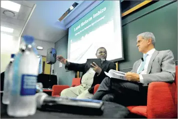  ?? PICTURE: ITUMELENG ENGLISH ?? ‘WE ARE NOT RECKLESS’: ANC secretary-general Gwede Mantashe speaking at the Land Reform Imbizo in Illovo, Joburg, yesterday. On the right is the Transforma­tion Initiative’s Roelf Meyer.