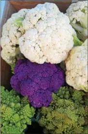  ?? PHOTO BY EMILY RYAN ?? A colorful display tempts shoppers at the West Chester Growers Market.