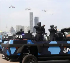  ??  ?? Police special forces take part in Police Day parade. — Bernama photo