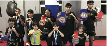  ?? ?? FANTASTIC TEAM: Back, from left, Aimane Laurent, Yasser Essai, Khrya Takhrar, Yahya Bunglawala and Esa Khan. Front row, from left, Shua Saumtally, Hud Mokhfi, Nuh Mokhfi and Adam Mokhfi from the Tigerz gym