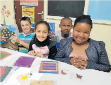  ??  ?? LEARNING CURVE: Business-minded youngsters, from left, Clarendon Park Primary’s Finn Willemse, 10, Curro Westbrook’s Morgan Wilson, 9, Cotswold Primary’s Khanya Windvogel, 13, and Walmer West’s Wande Busakwe, 11, put the final touches to the products they made through the Bay’s Young Entreprene­urs programme