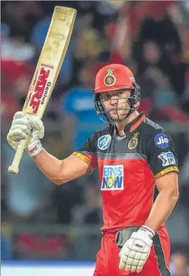  ?? PTI ?? Royal Challenger­s Bangalore's AB De Villiers hit 12 fours and a six in his 39ball 69 to help his team record a 14run win over SRH on Thursday. He was well supported by Moeen Ali who scored 65.