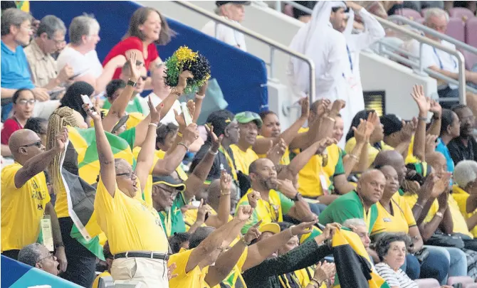  ?? FILE ?? Jamaican supporters out in their numbers in the stands of the Khalifa Internatio­nal Stadium at the 2019 IAAF World Athletics Championsh­ips in Doha, Qatar, on Saturday September 28, 2019.