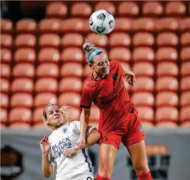  ?? Brett Coomer / Staff photograph­er ?? To get into playoff position, Megan Oyster, right, and the Dash will need to stop conceding early goals, like they did in their last match against the OL Reign. A win against the Pride would give the Dash a tiebreaker.