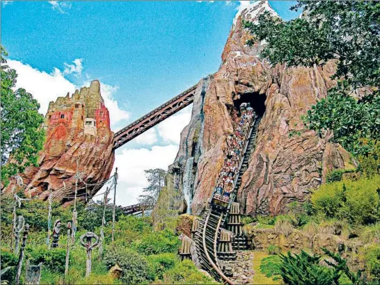  ?? BRUCE PECHO/FOR THE CHICAGO TRIBUNE ?? Expedition Everest is one of nearly 50 rides spread over four theme parks at Walt Disney World Resort in Florida. Some people try to ride them all in one day.