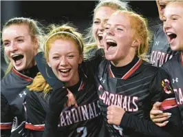  ?? BALTIMORE SUN MEDIA JOHN GILLIS/FOR ?? Crofton players Cassidy Nichols, from left, Emily Wingeart, Meghan Piazza and Nora Snyder celebrate a 1-0 win over Mt. Hebron in the Class 3A girls soccer state championsh­ip game at Loyola Maryland’s Ridley Athletic Complex in Baltimore on Thursday.