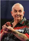  ?? Foto: dpa ?? Der erfolgreic­hste Darts Spieler der Ge schichte: Phil Taylor.