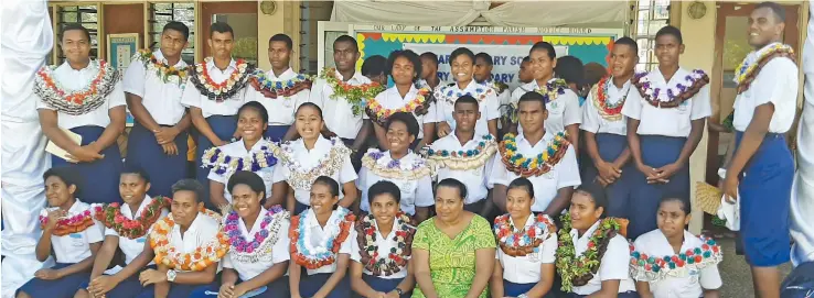  ??  ?? Lomary Secondary School student leaders with their Principal Venina Inoke (front seventh from left) after the prefects induction ceremony.